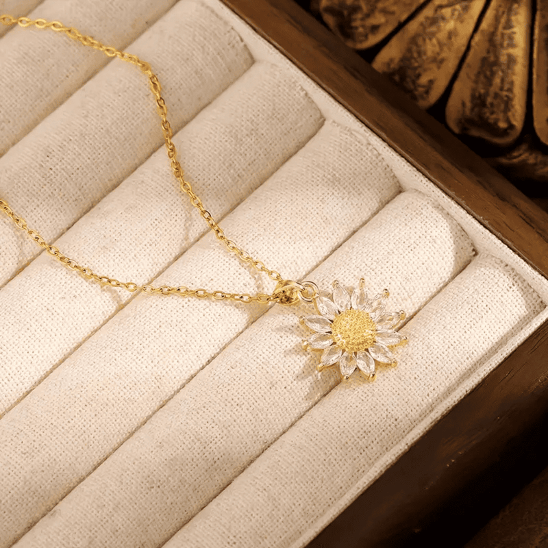 Collar girasol giratorio - MODA DE LUJO